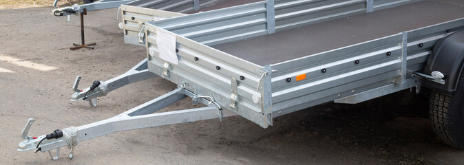 Open car trailer. Trailer for passenger cars.Sale, rental and maintenance of trailers.