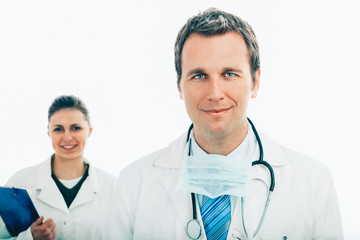 Medical team of two young doctors isolated on white background