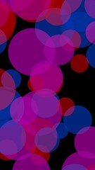 Multicolored translucent circles on a dark background. 3D illustration