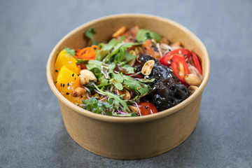 Traditional Hawaiian poke salmon dish in a cardboard box