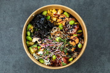 Traditional Hawaiian poke salmon dish in a cardboard box