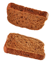 Slices of toasted bread flying isolated on white