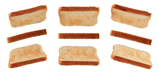 Slices of toast flying isolated on white