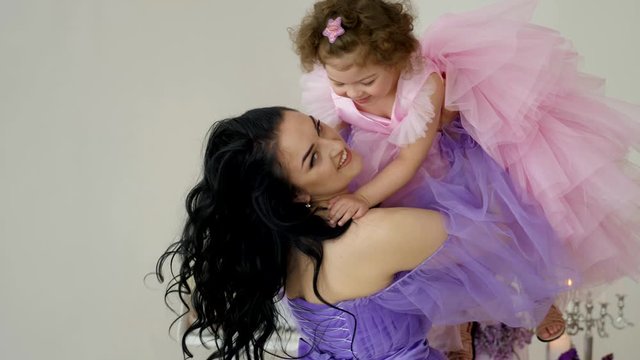 mother and daughter sharing happiness and emotions