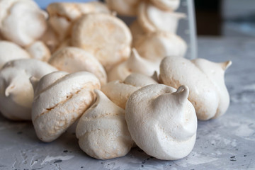 Meringue. sweet meringues. Meringue tray. Close up photo of meringues. Dessert Background.