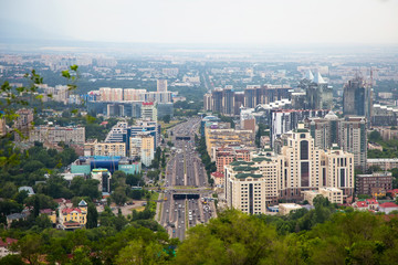 City summer landscape. Central Highway, Al-Farabi Avenue. Almaty, Kazakhstan