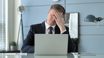 Businessman with Headache