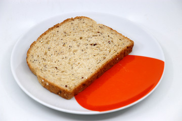 Slice of organic bread on a dish