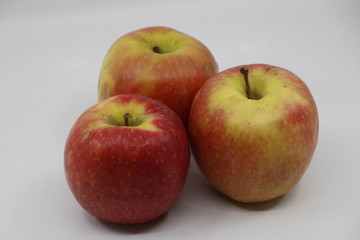 Red apples in white background