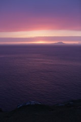 Obraz premium Pink and orange sky over the ocean. 
