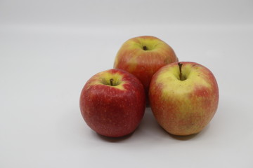 Red apples in white background