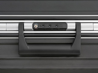 Obraz premium Detail suitcase with number lock for zipper