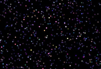 Small bokeh pattern on black background isolated. Purple pink blue yellow colors.