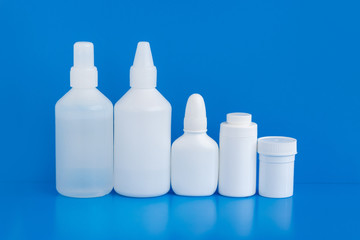 Plastic packaging medicine bottles for cosmetics vitamins pills or capsules. A container mock-up of an object to illustrate a drug pill.