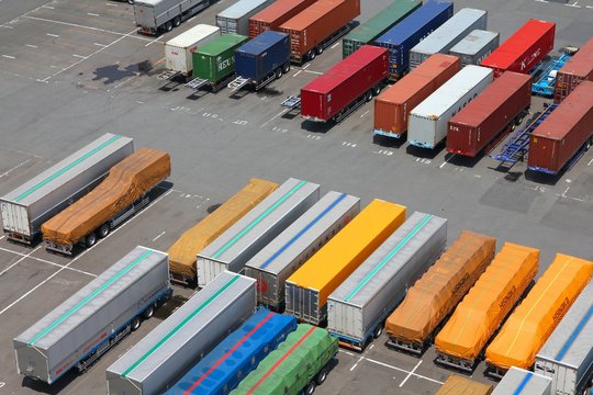 TOKYO, JAPAN - MAY 11, 2012: Containers in Port of Tokyo in Tokyo. Port of Tokyo is one of busiest seaports in the Pacific Ocean basin with 100 million tonnes of cargo handled annually.