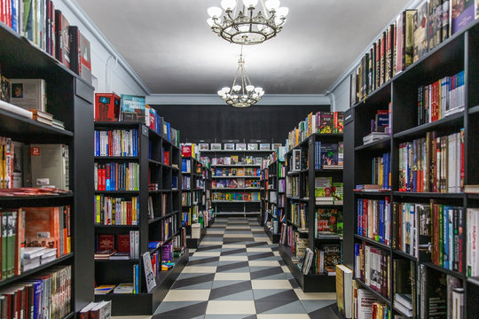 Moscow, Russia, 27/02/2020: Floor racks with books in a stylish store. Knowledge and education. Blurred.