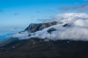 Cloudy foggy mountains landscape view of Exo Mani near Areopoli, Peleponnes, Greece