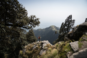 hiker on top of mountain