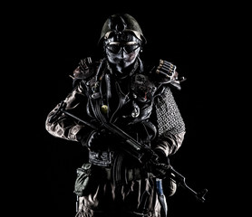 Naklejka premium Nuclear post apocalypse life after doomsday concept. Grimy survivor with homemade weapons. Studio portrait