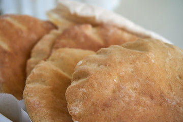 Pita bread on a white background - fresh baked gluten-free pita bread