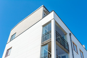 Fototapeta na wymiar Modern Luxury Scandinavia Apartment Building Blue Sky Facade Home Residential Structure