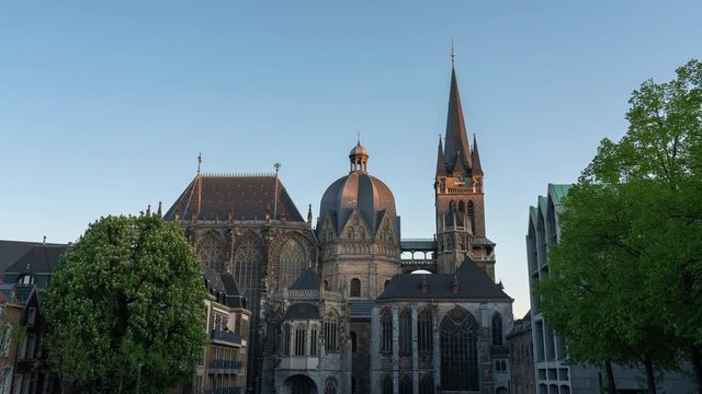 Day to night time lapse zoom of Aachener Dom Cathedral, view from Katschhof. This buidling is a UNESCO world heritage.