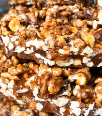 Granola bar in a bowl for sale. Healthy sweet dessert snack. Cereal granola bar with nuts