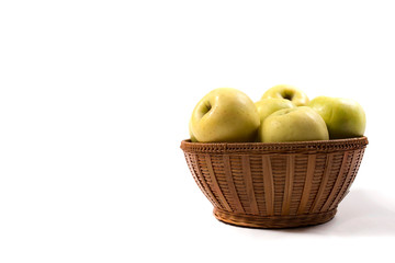 Juicy green apples in a basket