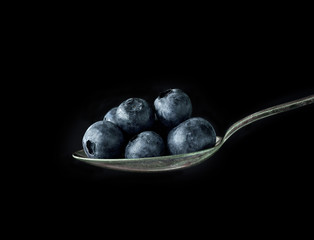 spoon of blueberries