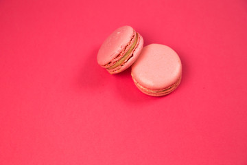 Macaroons on a pink background