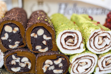 Various types or many colorful assortment of Turkish delights rolls for sale in a shop in Istanbul