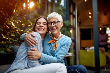 portrait of a senior mother and adult daughter, hugging, smiling. Love, affection, happiness concept - 346816878