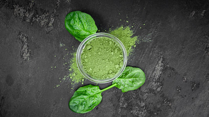 Freshly made spinach powder (close up; selective focus)