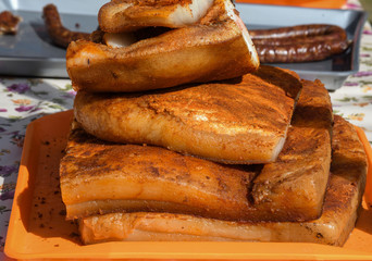 Romanian traditional salty pork belly specialty named slanina, on counter