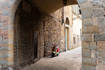 Old street of Bergamo Town, Italy. Nobody. Old italian street with none and scooter. Travel. 