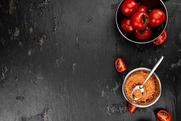 Portion of Tomato Powder (close up; selective focus)