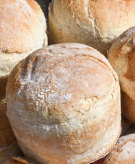Homemade traditional buns of bread, authentic rustic recipe on counter top during food festival