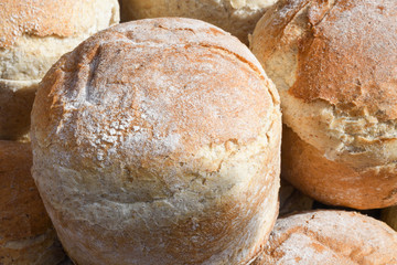 Homemade traditional buns of bread, authentic rustic recipe on counter top during food festival