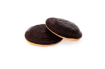 Brown delicious cookies lie on top of each other.