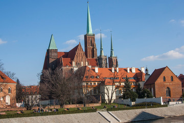  church, architecture, tower, old, castle, town, city, building, europe, sky, travel, medieval, roof, landmark, cathedral, view, blue, ancient, history, cityscape, house, wall, capital