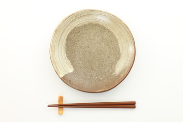 empty dish with copsticks