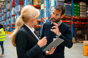 Managers in Warehouse discuss about business strategy	
