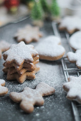 Christmas new year background with gingerbread and powdered sugar diet food diet coocies with ginger