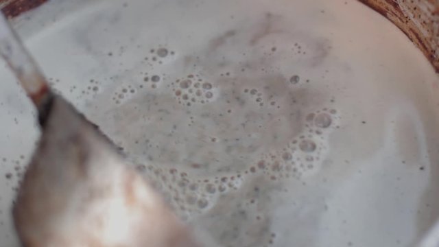 Closeup Of Indian Spiced Chai Tea Being Made, Traditional Drink.