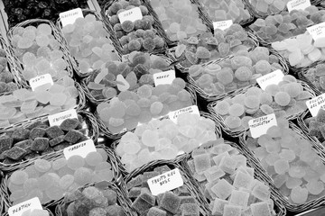 Sweets in Boqueria Market, Barcelona. Black and white vintage style.