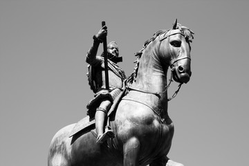 Fototapeta na wymiar King monument in Madrid city. Black and white vintage style.