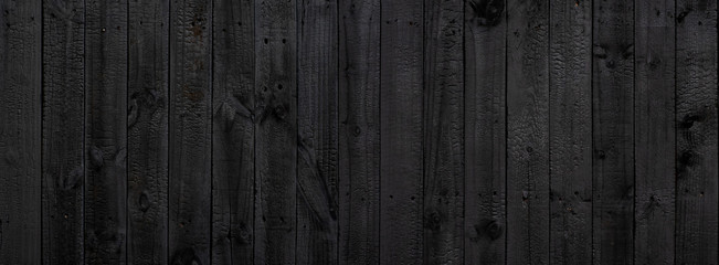 Black wood texture background coming from natural tree. Old wooden panels that are empty and...
