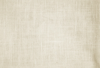 Fototapeta na wymiar Light brown linen background Weaving Canvas Fabric Texture background. or Natural brown cloth surface .