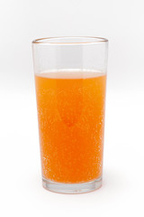 soluble effervescent multivitamin in a glass glass with water on a white background
