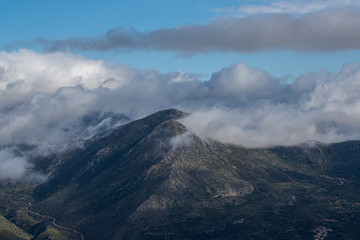 Cloudy foggy mountains landscape view of Exo Mani near Areopoli, Peleponnes, Greece